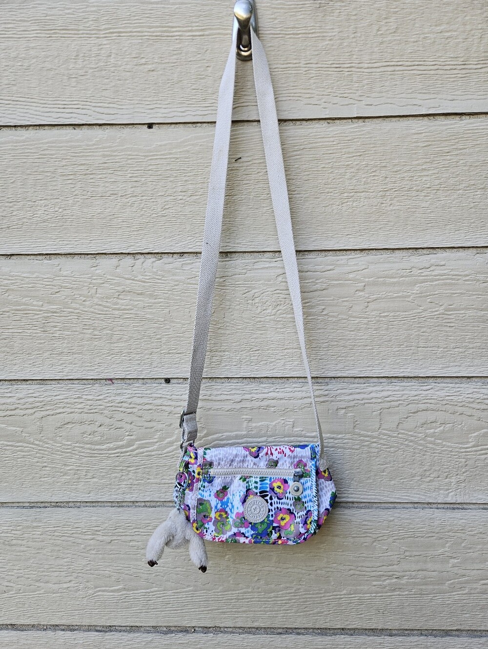 Kipling mini abstract floral crossbody with Louise monkey keychain